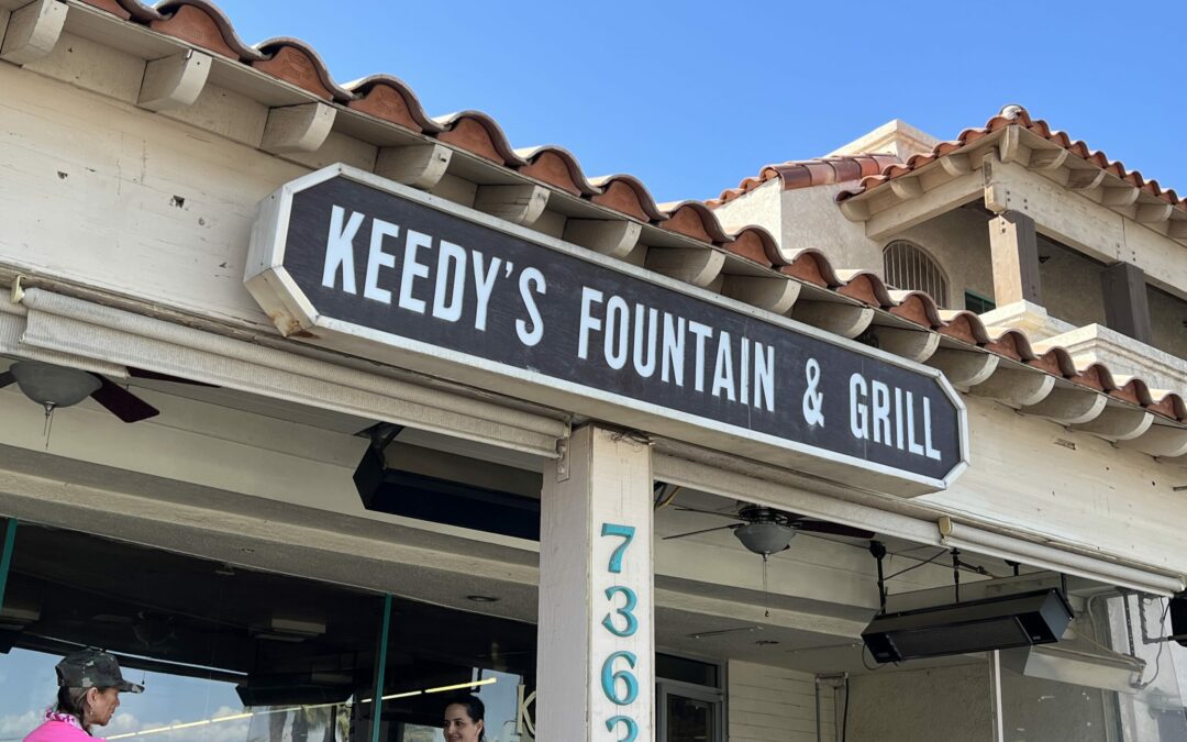Keedy's Fountain & Grill sign on a sunny day.